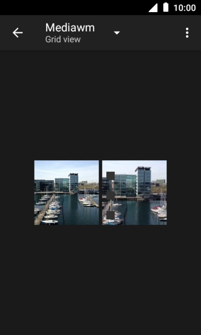 Press and hold any picture or video clip.