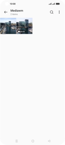 Press and hold any picture or video clip.