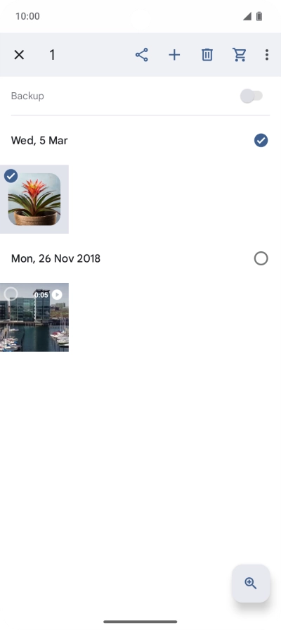 Press the required pictures or videos to select them.