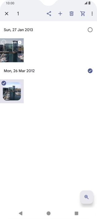 Press the required pictures or videos to select them.