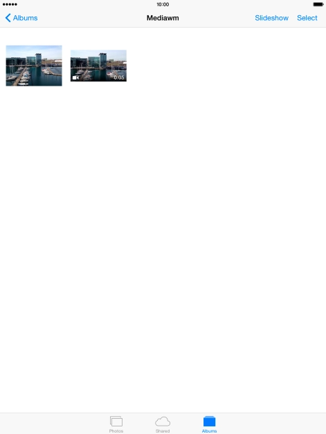 Go to the required folder and press the required picture or video clip.
