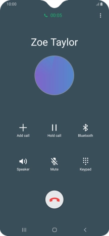 Press the end call icon.