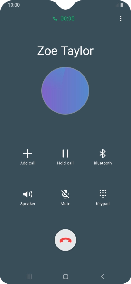 Press the end call icon.