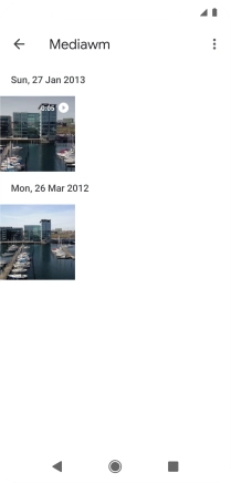 Press and hold any picture or video clip.