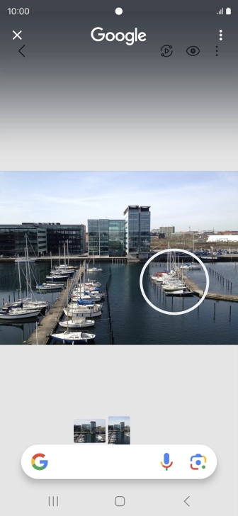 Draw a circle around the required object on the picture and wait for the search results.