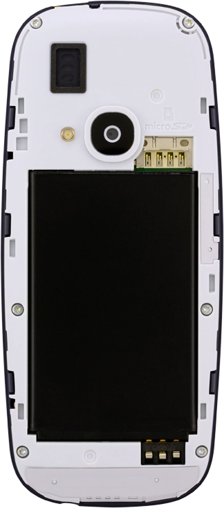 Take hold of the top of the battery and remove it.