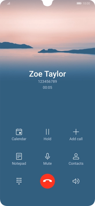 Press the end call icon.