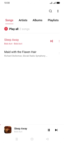 Press the song title at the bottom of the screen.