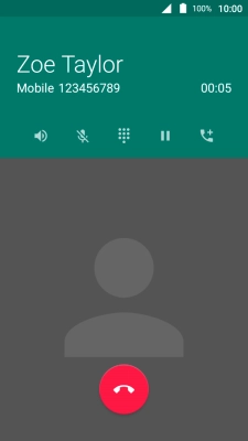 Press the end call icon.