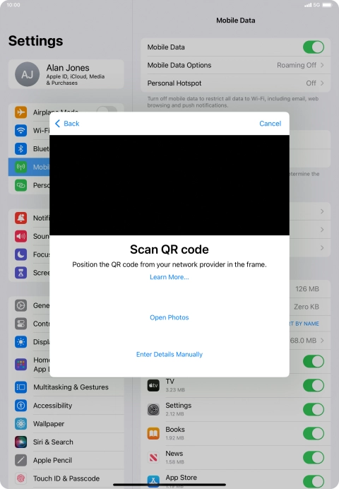 Place the QR code you've received inside the tablet camera frame to scan the code.
