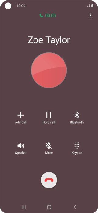 Press the end call icon.