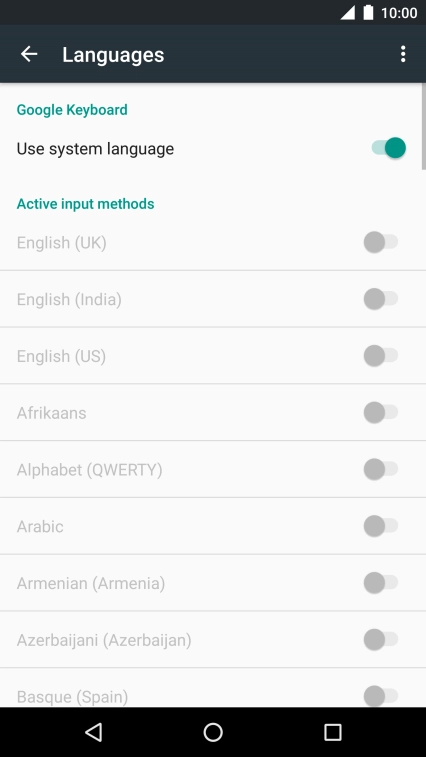 Press Use system language to turn it off.
