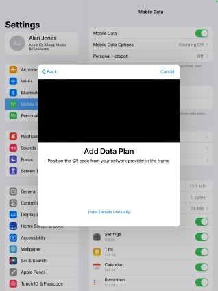 Place the QR code you've received inside the tablet camera frame to scan the code.