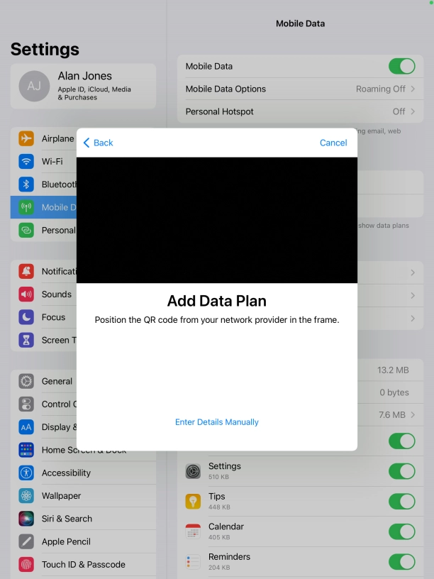 Place the QR code you've received inside the tablet camera frame to scan the code.
