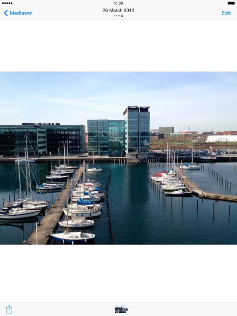 Make sure the other device is turned on and is ready to connect via AirDrop. Press the share icon.