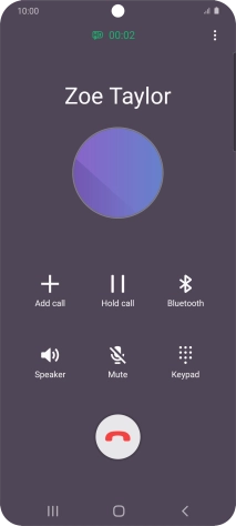 Press the end call icon.