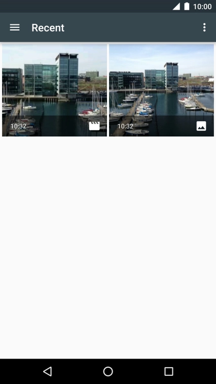 Slide your finger right starting from the left side of the screen.