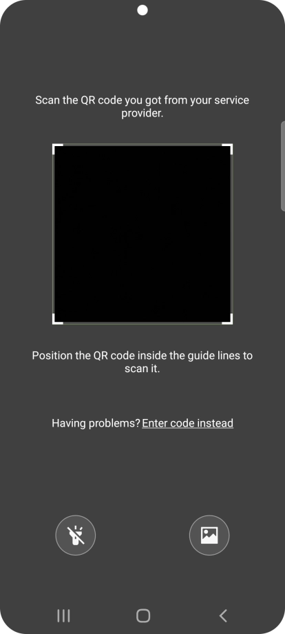 Place the QR code you've received inside the phone camera frame to scan the code.