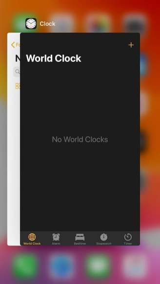 Slide upwards on the required application to end it.