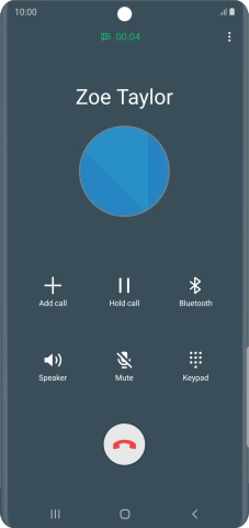 Press the end call icon.