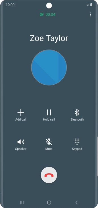 Press the end call icon.