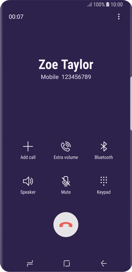 Press the end call icon.