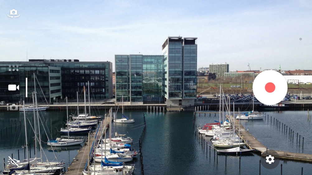 If the camera is turned on, slide your finger downwards on the screen to select the video icon.