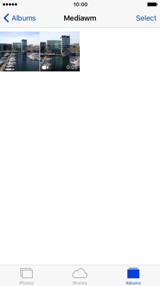 Go to the required folder and press the required picture or video clip.
