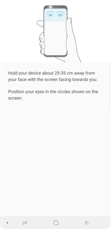 Follow the instructions on the screen to create the phone lock code using iris scanning.