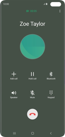 Press the end call icon.