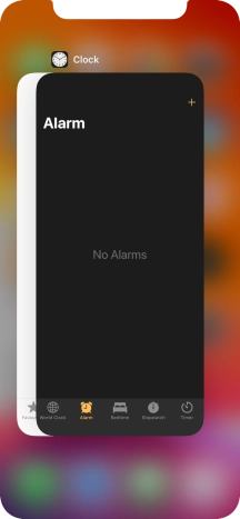 Slide upwards on the required application to end it.