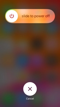 Press and drag the power off icon right.