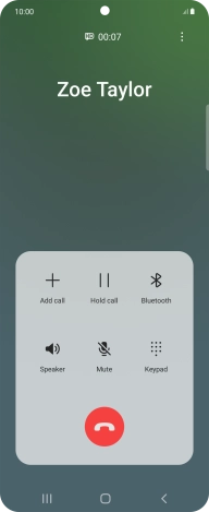 Press the end call icon.