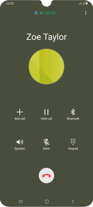 Press the end call icon.