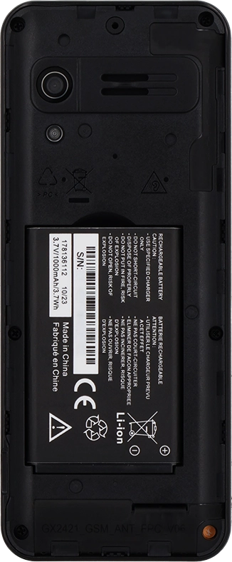 Take hold of the top of the battery and remove it.