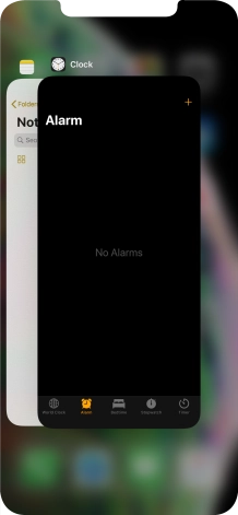 Slide upwards on the required application to end it.