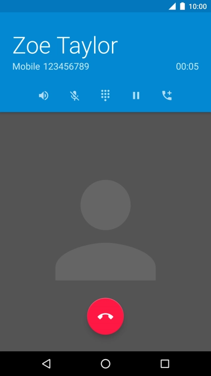 Press the end call icon.
