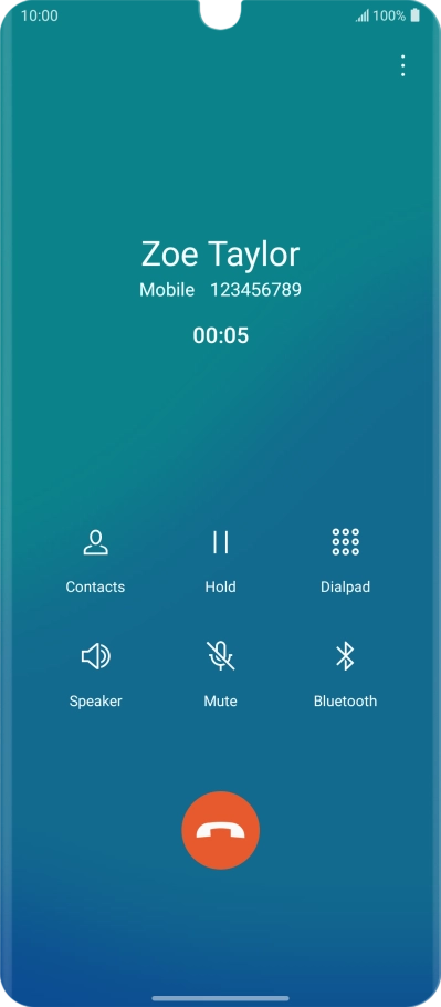 Press the end call icon.