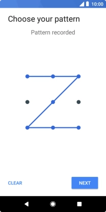 Slide your finger across the screen to connect at least four points and press NEXT.