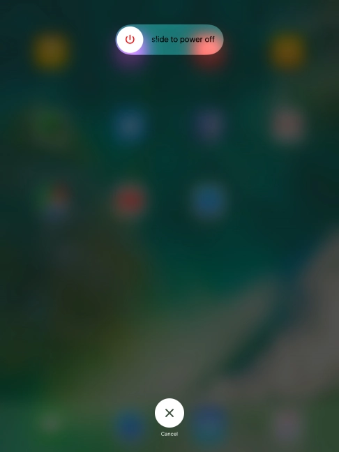 Press and drag the power off icon right.