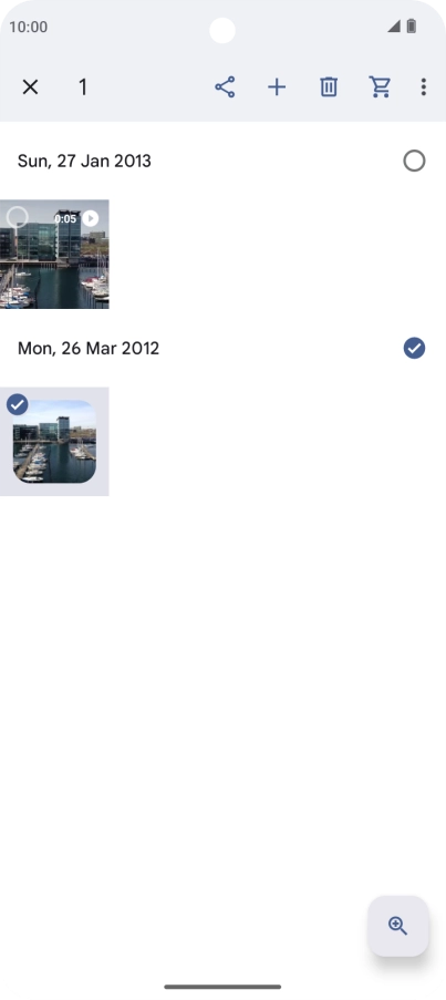 Press the required pictures or videos to select them.