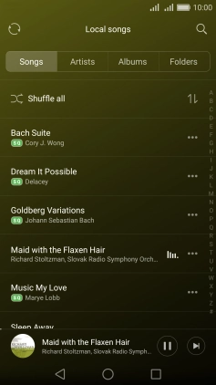 Press the song title at the bottom of the screen.