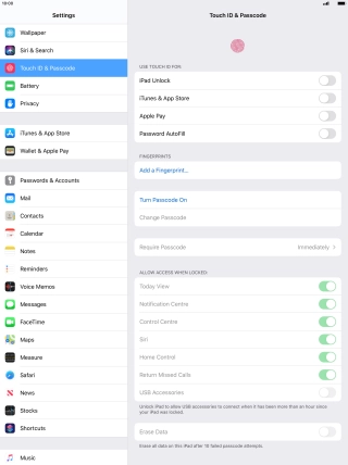 Press Turn Passcode On and key in a lock code of your own choice twice.