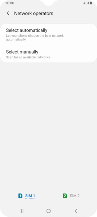 Press Select manually and your phone will search for networks.