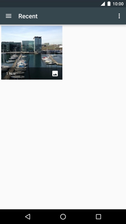 Slide your finger right starting from the left side of the screen.