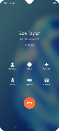 Press the end call icon.