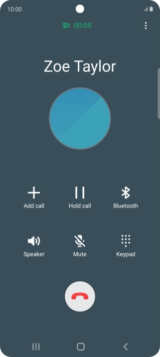 Press the end call icon.