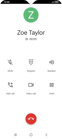 Press the end call icon.