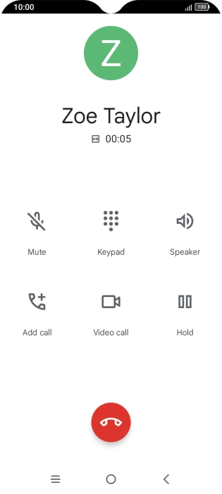 Press the end call icon.