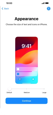 Select the required text and icon size on your phone and press Continue.